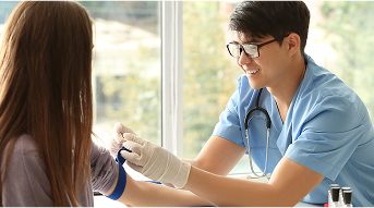 Medical professional with patient